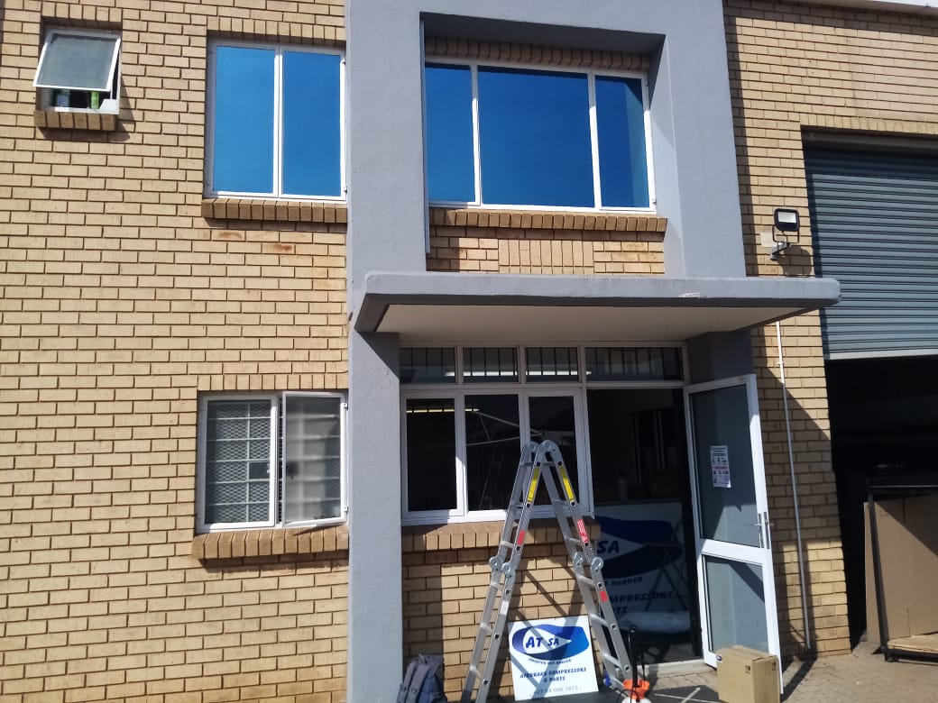 Blue reflective window film installed illustration